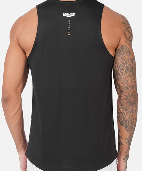 A man wearing a black sleeveless tank top, shown from the back. The tank top has a small white 'DUALFLEX' logo and a vertical line of small colored arrows near the upper back.